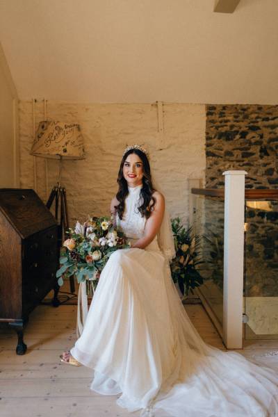 Bride sits on her own before ceremony begins