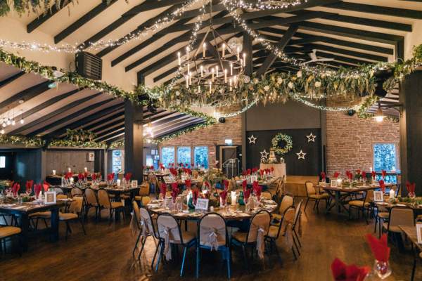 Interior dining room candles lit on tables chandelier decor