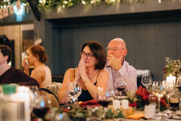 Emotional woman listening to the speeches