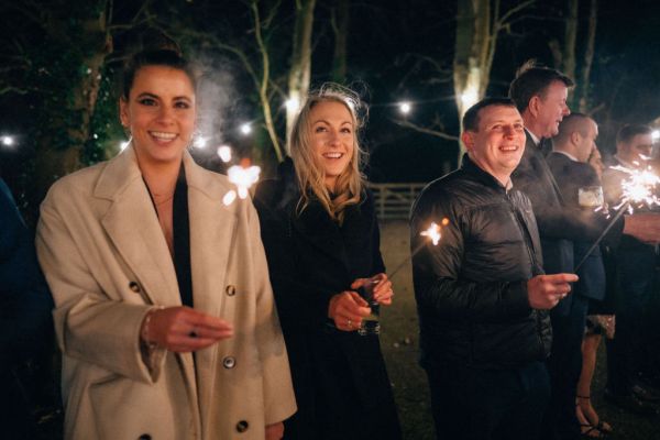 Guests outside in forest setting