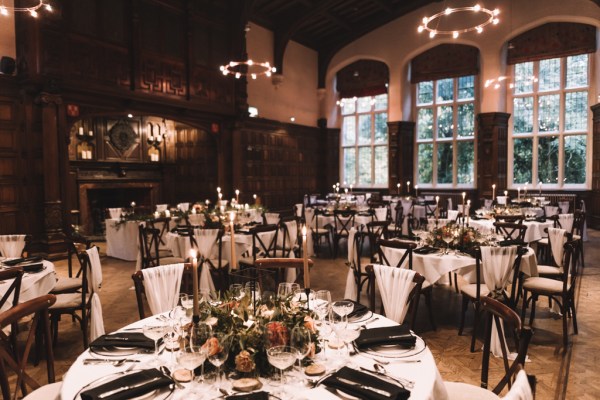 Empty dining room ballroom setting tables and chairs for guests