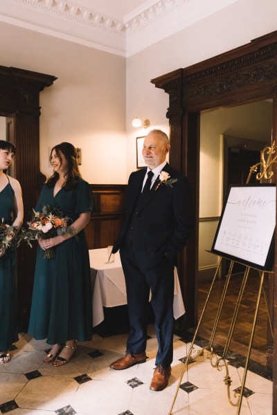 Father bridesmaids and bride enter ceremonial room