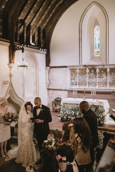 Bride and groom at alter to church