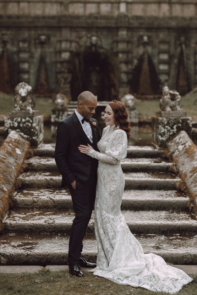 Bride and groom at the end of steps wedding venue couple setting