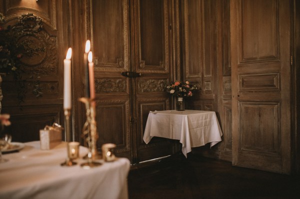 Candles lit interior dining room setting