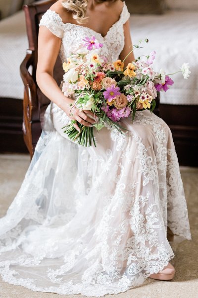 Bouquet flowers lace dress gown blonde wavy hair