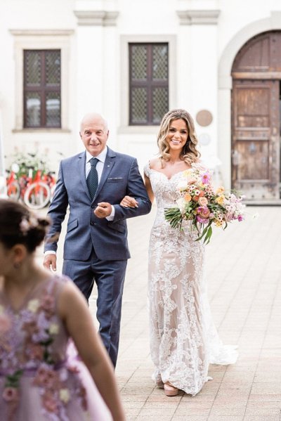 Father walks bride down the aisle