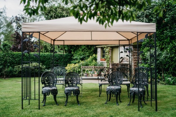 Sears for guests under tent setting