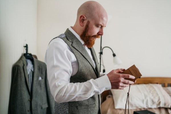 Groom opening gift