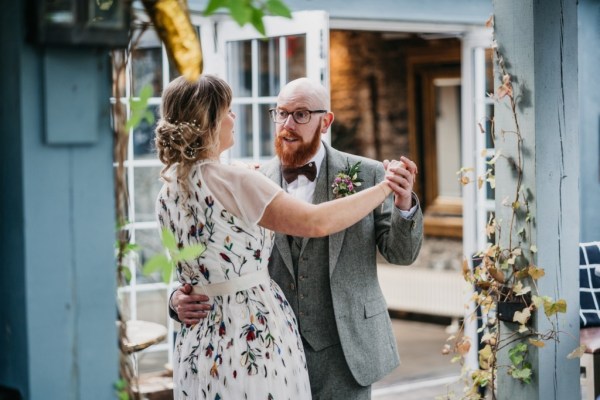 Bride and groom dance together