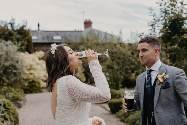 Bride downs champagne/prosecco from the glass drink