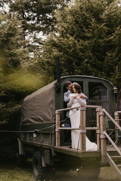 Army truck bridge bride and groom