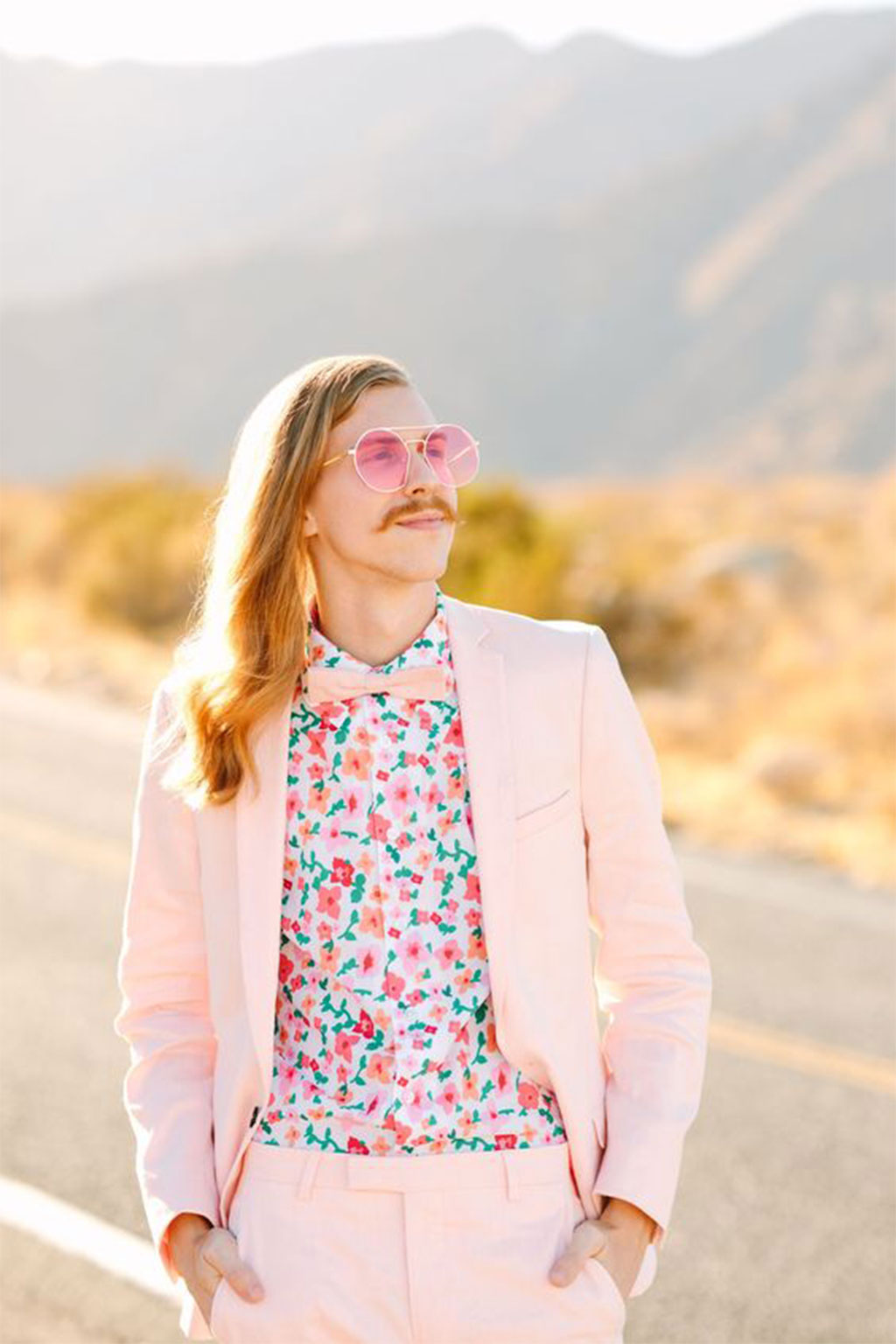 grooms in pink suits