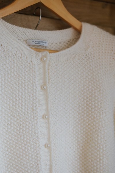 Close up of pearl cardigan