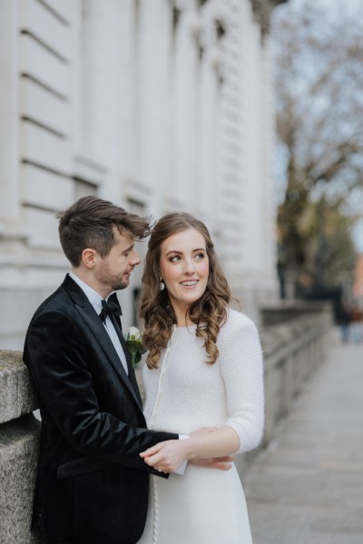 Bride looks away groom looks at her on Dublin street