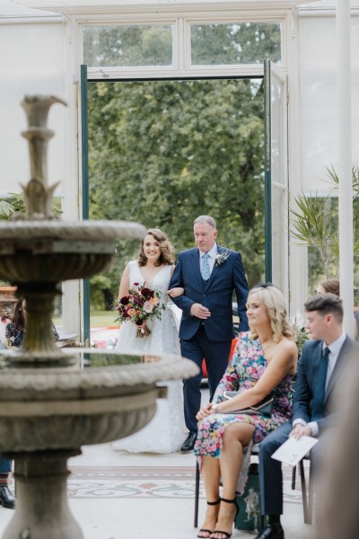 Father walks daughter bride down the aisle