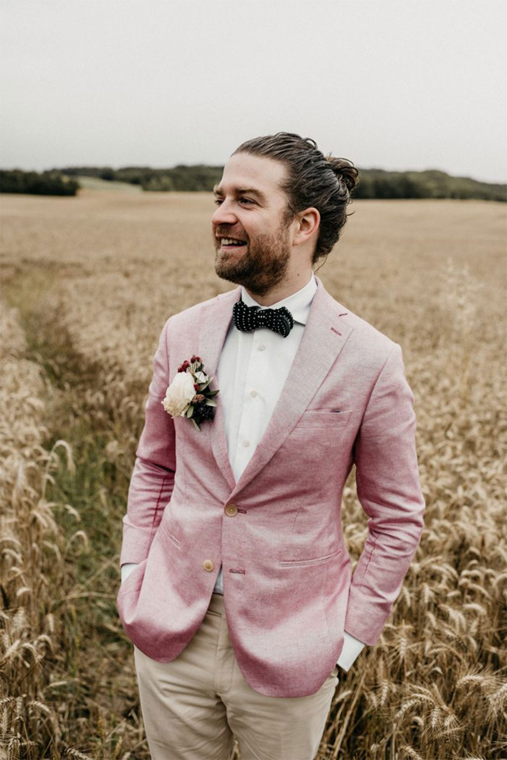 grooms in pink suits