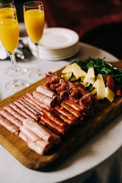 Selection of ham meats and cheese cheeseboard guests food