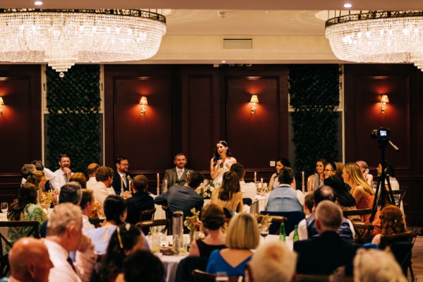 Bride gives speech to audience/guests