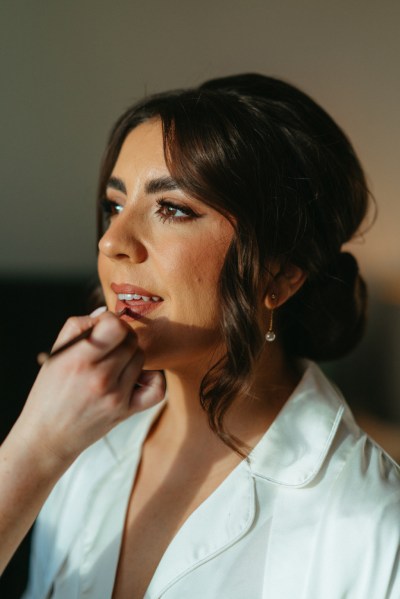 Close up of bride getting her makeup done MUA