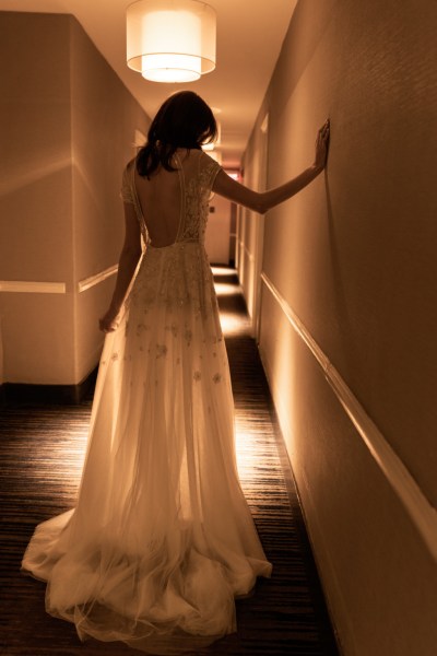 An Ode to Sophia: Bo & Luca Collection Gable Gown model in corridor