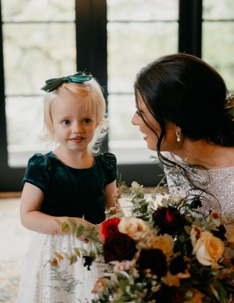 Little blonde girl and bride