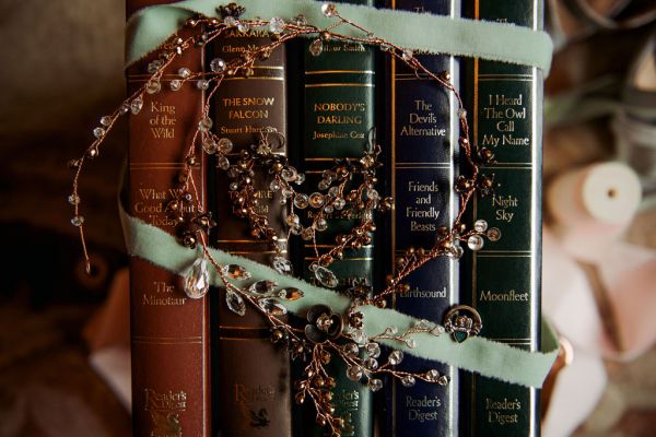 Books covered in accessory detail ribbon old fashioned books