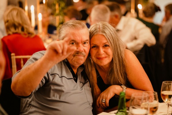 Man and woman smile for the camera