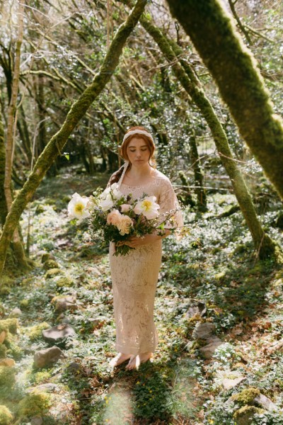 Close up of red headed bride woman model hair and flowers roses sunflower yellow white headband detail