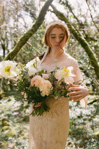 Close up of red headed bride woman model hair and flowers roses sunflower yellow white headband detail