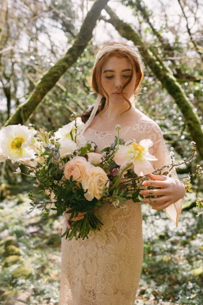 Close up of red headed bride woman model hair and flowers roses sunflower yellow white headband detail