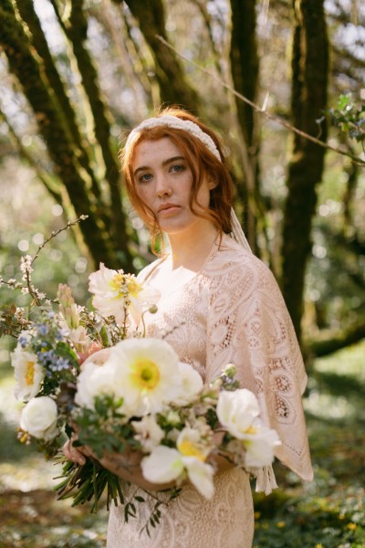 Close up of sunflower yellow white and bride wearing headband