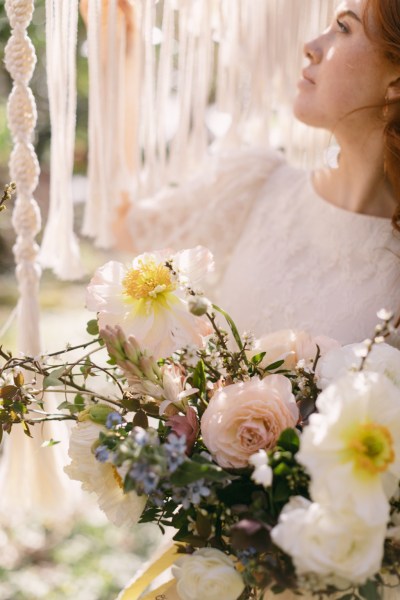 Close up of bouquet flowers sunflowers roses strings behind