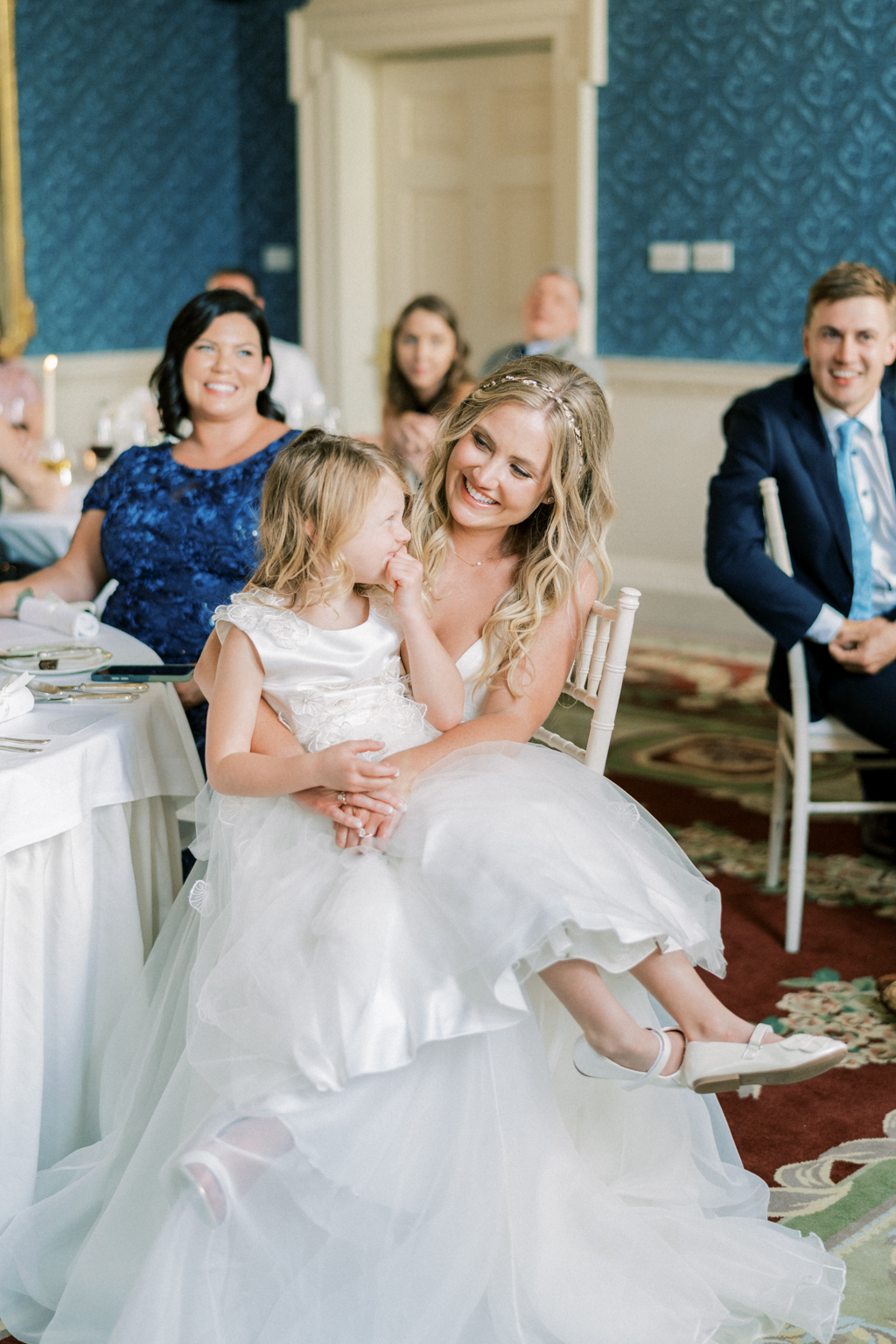 Mother bride and daughter seated