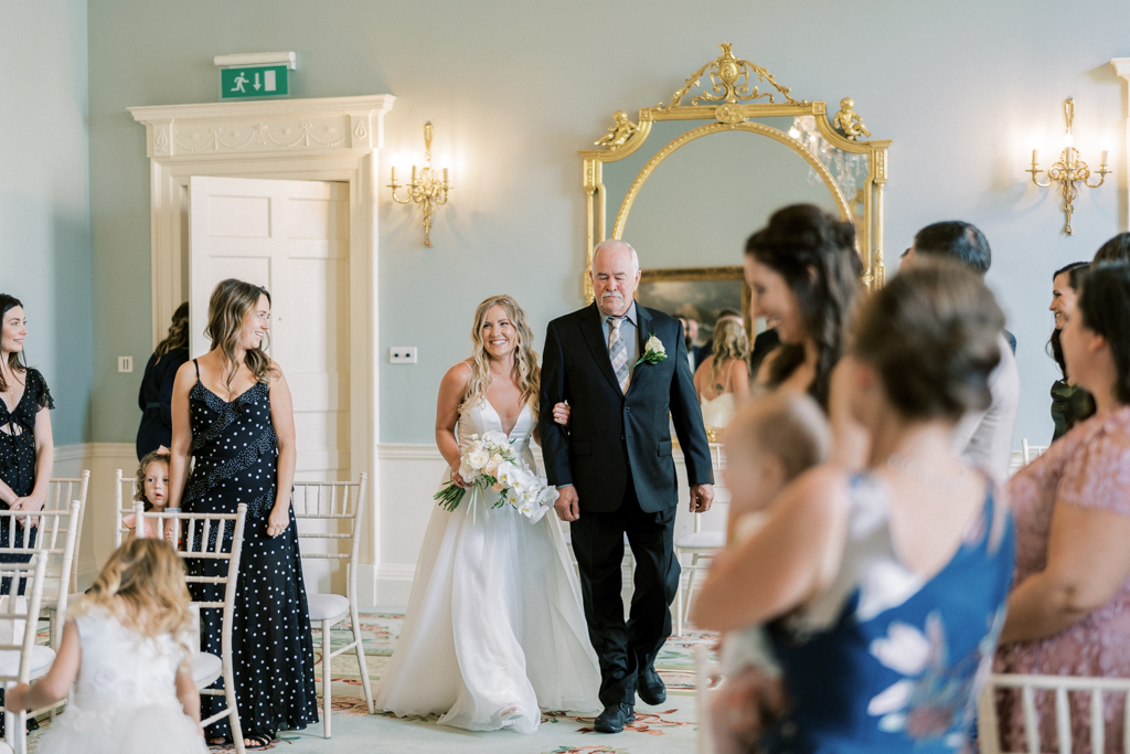 Father of the bride walks down the aisle