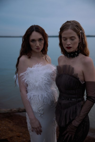 Hermione de Paula's new 2023 collection: 'Moon Phases' tight-fitting feather dress and black swan gown wedding in front of lake setting