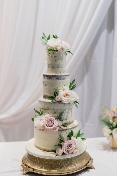 White wedding cake flowers pink roses