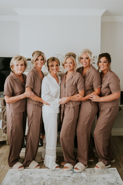 Bride and her bridesmaids wearing bridalwear