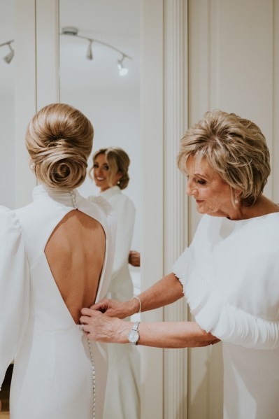 Mother and bride getting ready