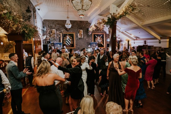 Packed dancefloor group shot dancing