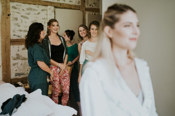 Bride in front of her bridesmaids