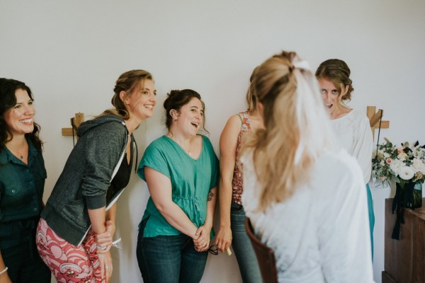 Bridesmaids react to bride wearing veil