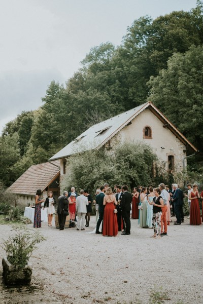 Guests outside manor hotel house