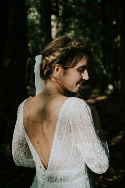 Brides hair from behind and dress dark evening shot