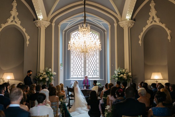 Bride and groom at top of church alter