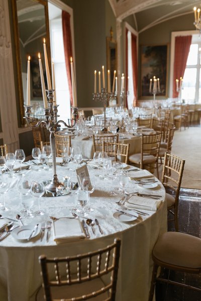 Empty ceremonial dining room table and chairs