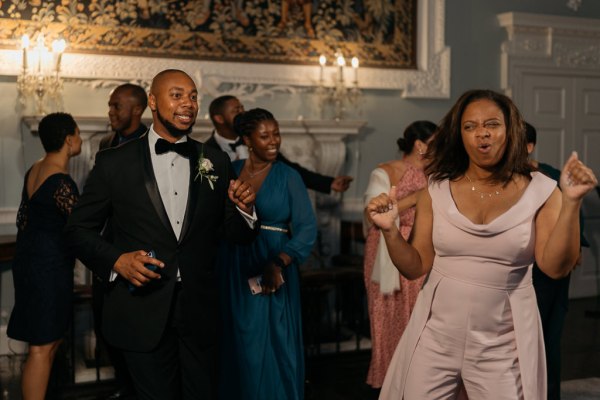 Guests dance together on the dancefloor