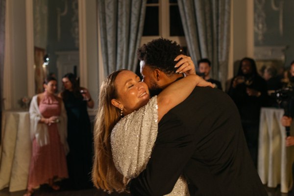 Shot of bride and groom dancing on the dancefloor