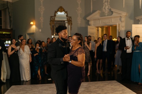 Mother and son groom dance on the dancefloor