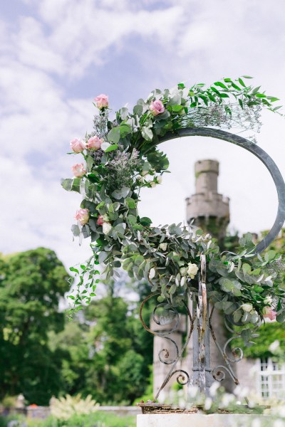 Castle view through circular bed of flowers